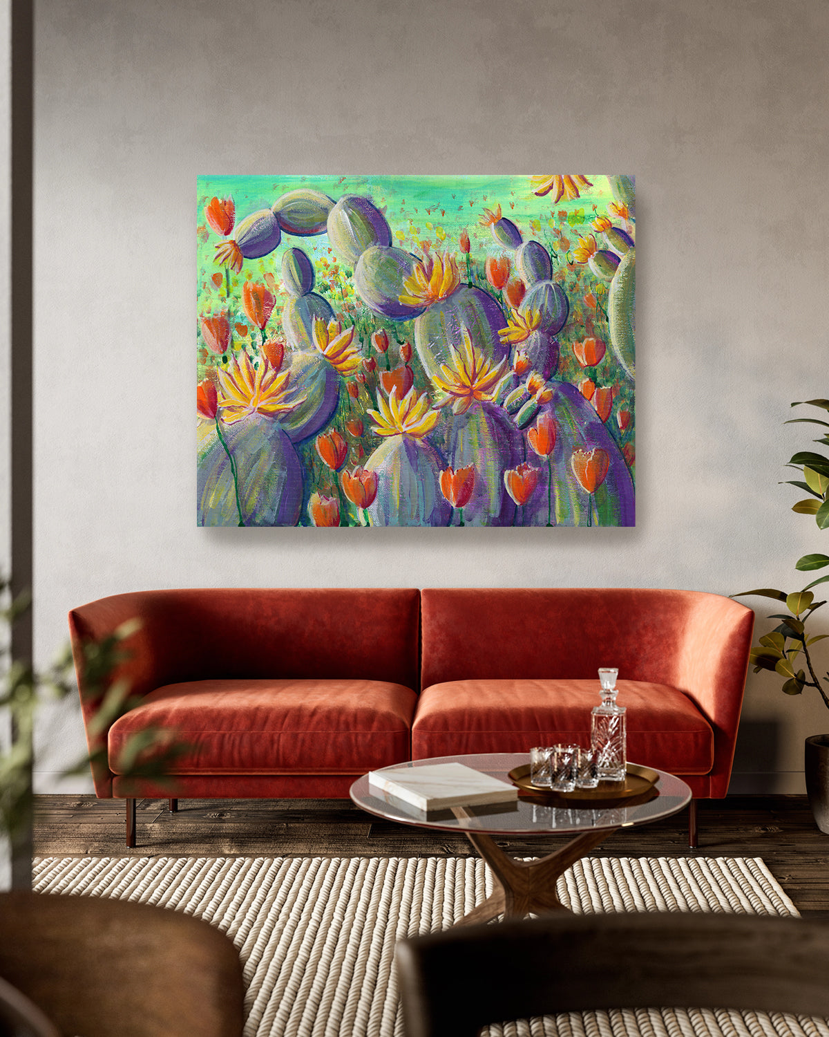 Flowering Cacti No. 002 stretched canvas art print featuring flowering cacti and poppies. Mockup above a sofa.