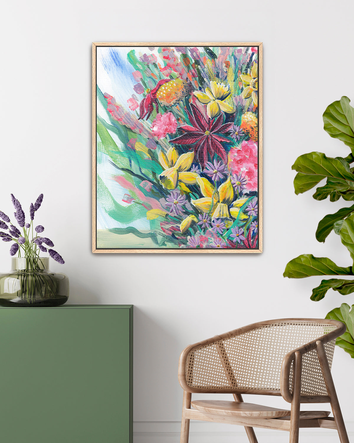 Bouquet No. 003 framed canvas art print featuring an assortment of birth vibrant birth month flowers including Carnations (January), Daffodils (March), Asters (September), Marigolds (October), and Poinsettias (December). Mockup above a table and console.