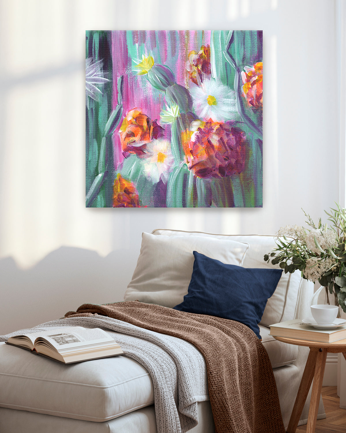 Flowering Cacti No. 005 framed canvas art print featuring flowering cacti. Mockup above a chaise.