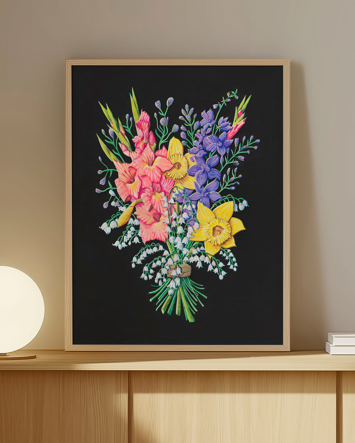 Framed floral artwork by Jen Montgomery on a wall