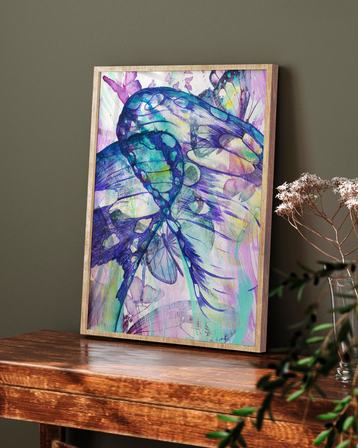 Surged Veil framed canvas art print featuring butterfly wings from the point of view of being inside of a cocoon. Mockup above a console in a living room.