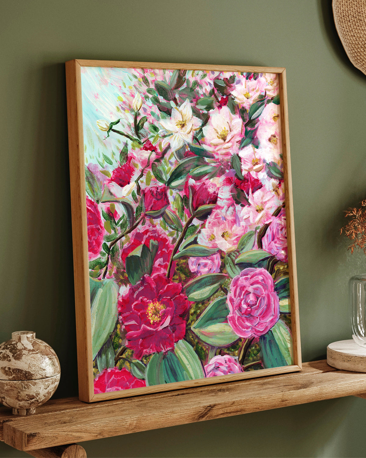 Echoes in Bloom framed art print featuring Camellias and white tea roses. Mockup on a wooden shelf.