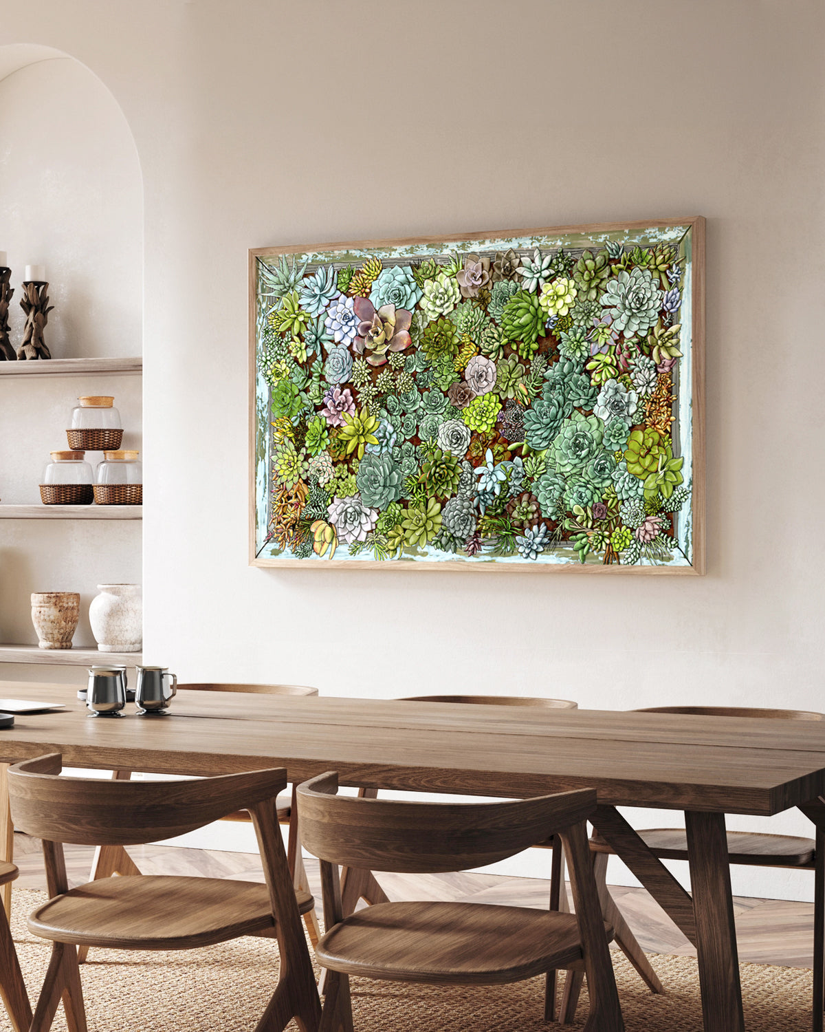 Succulent living wall art by Jen Montgomery on a wall.
