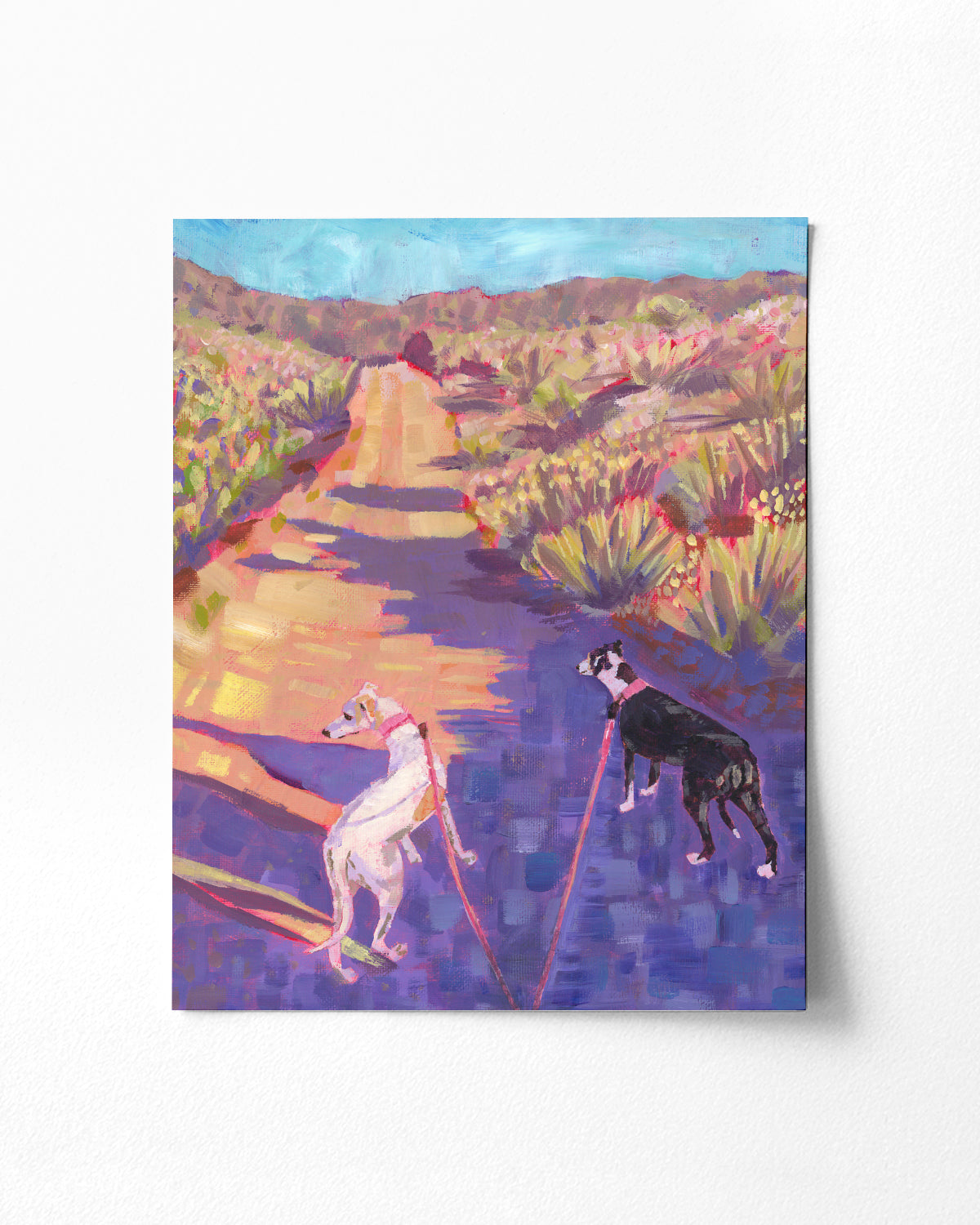Print of colorful acrylic painting of two dogs on a desert path in the California high desert hills, by artist Jen Montgomery
