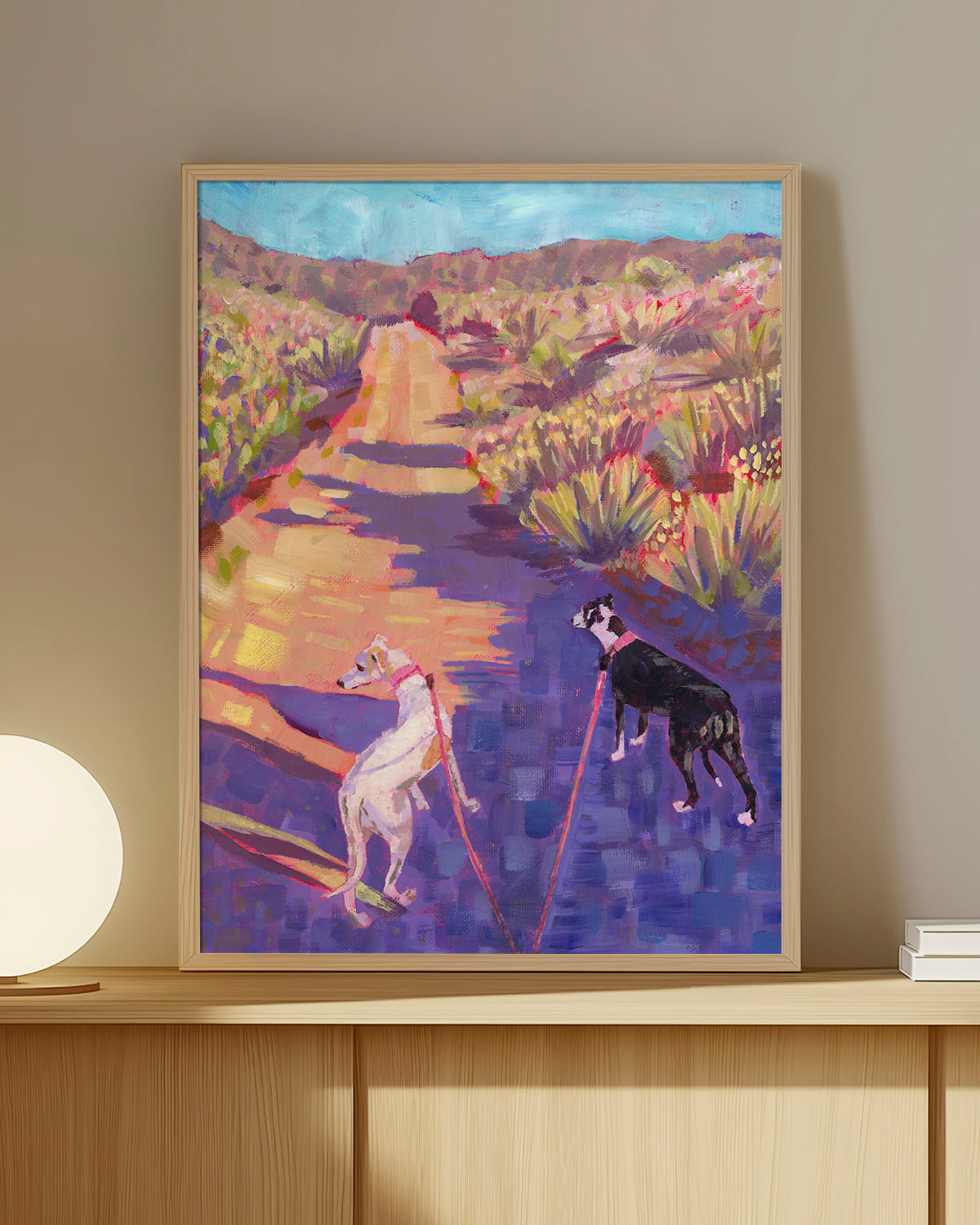Print of colorful acrylic painting of two dogs on a desert path in the California high desert hills, by artist Jen Montgomery
